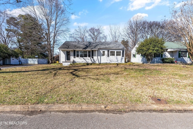 ranch-style house with a front yard