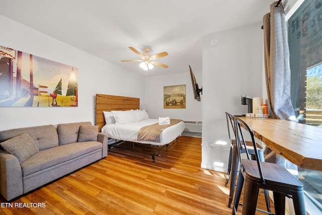 bedroom with light wood-type flooring