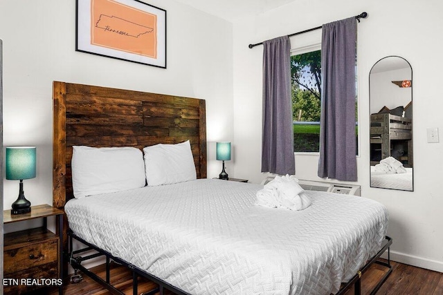 bedroom featuring dark hardwood / wood-style floors