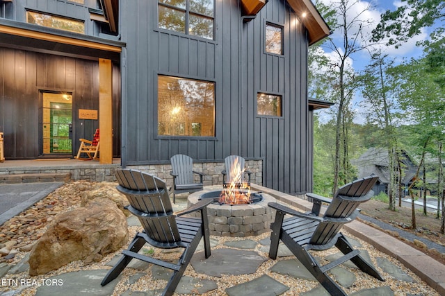 view of patio / terrace with an outdoor fire pit