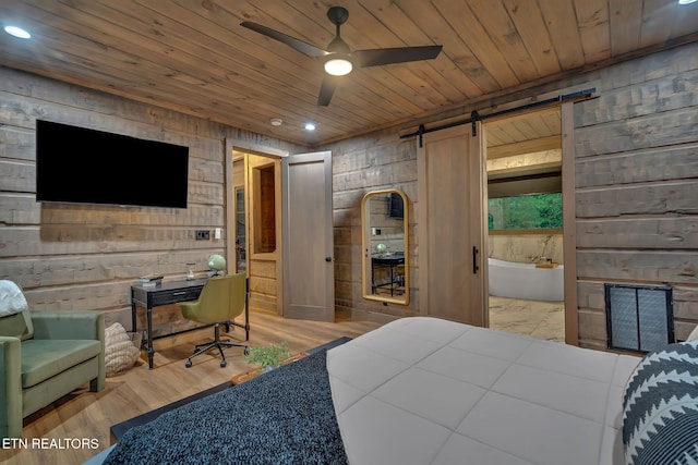 bedroom with recessed lighting, visible vents, a barn door, light wood-type flooring, and wooden ceiling