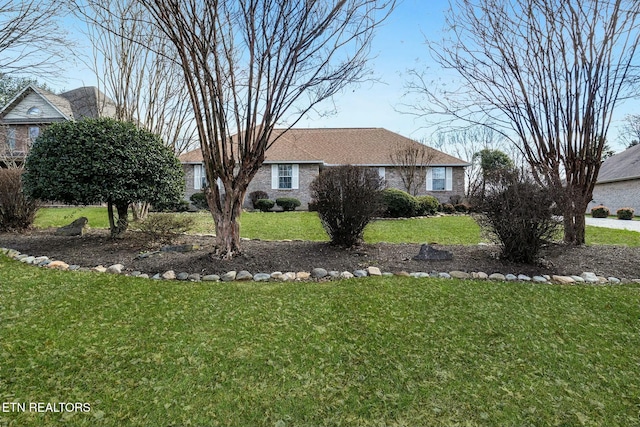 exterior space featuring a front lawn