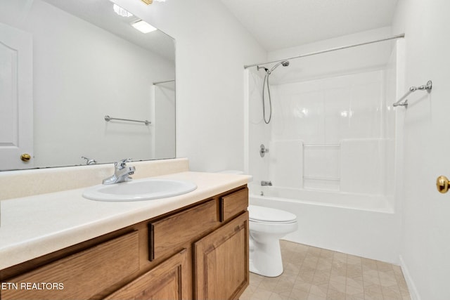 bathroom featuring shower / bathing tub combination, vanity, toilet, and tile patterned floors