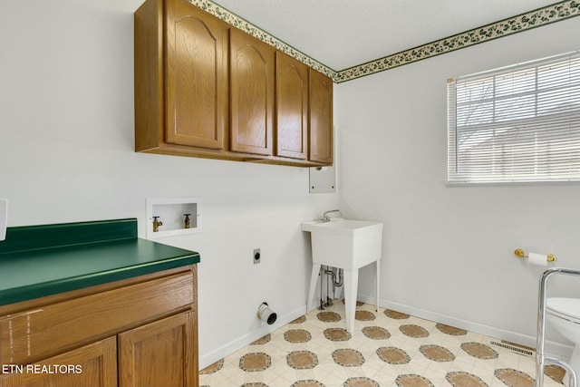 laundry room with washer hookup, cabinet space, visible vents, hookup for an electric dryer, and baseboards