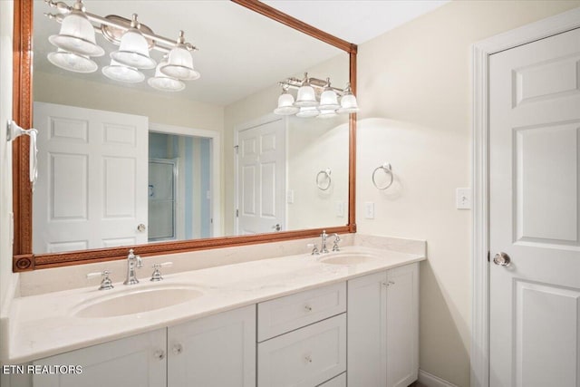 full bathroom with a sink and double vanity