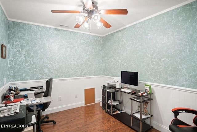 office featuring a wainscoted wall, visible vents, ornamental molding, wood finished floors, and wallpapered walls