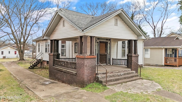 bungalow featuring covered porch