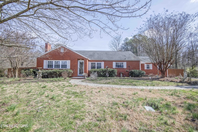 ranch-style house with a front yard