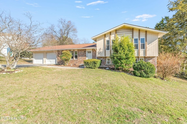 split level home featuring a garage and a front yard