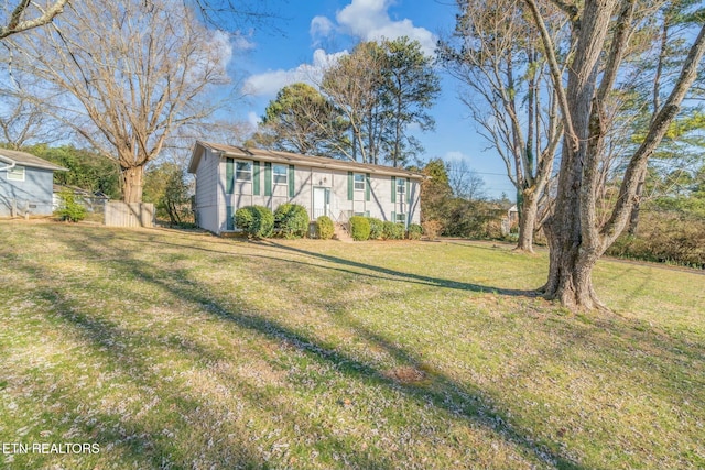 view of front of home featuring a front lawn