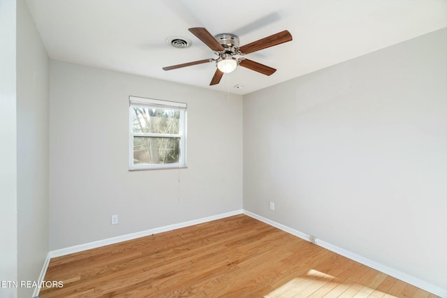 unfurnished room featuring ceiling fan and light hardwood / wood-style floors