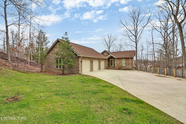 ranch-style home with a front lawn and a garage