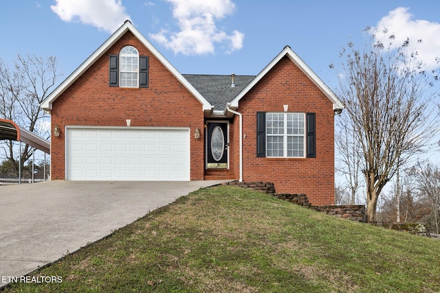 view of front of home featuring a front yard and a garage