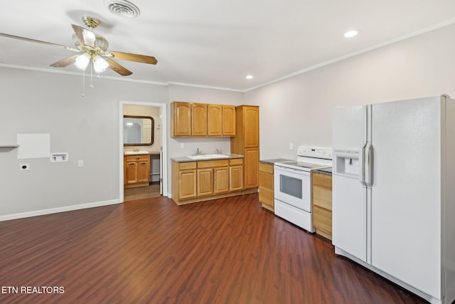 kitchen with white appliances, visible vents, ornamental molding, dark wood-type flooring, and light countertops