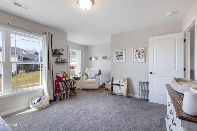 recreation room featuring carpet flooring