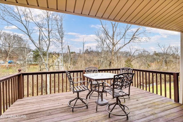 deck with outdoor dining space