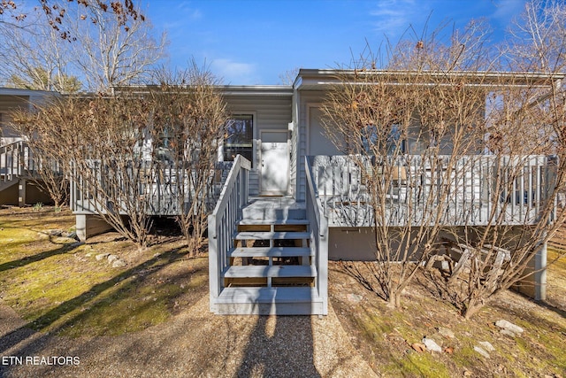 exterior space with a porch and stairs