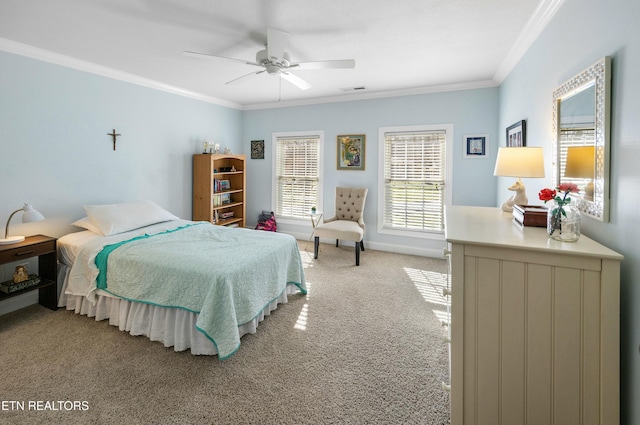 bedroom featuring baseboards, ornamental molding, a ceiling fan, and light colored carpet