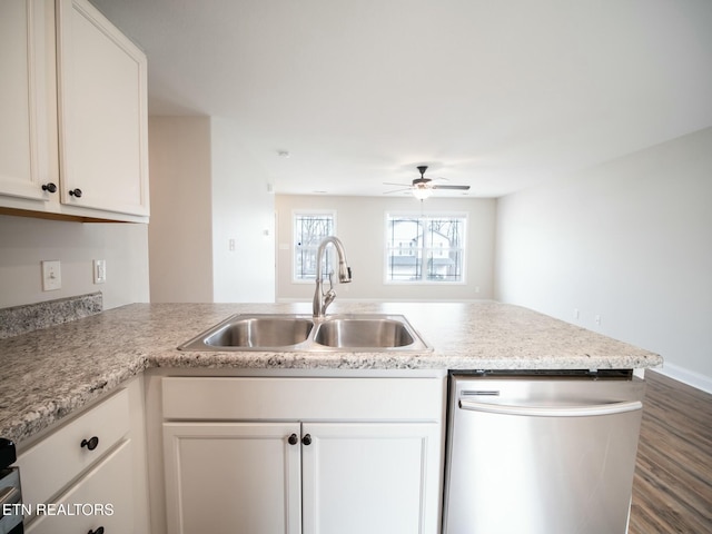 kitchen with dishwasher, white cabinets, ceiling fan, sink, and dark hardwood / wood-style floors