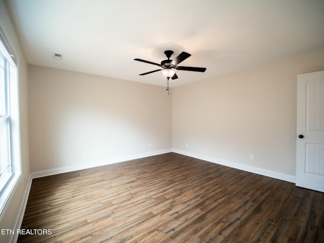 spare room featuring ceiling fan and wood-type flooring