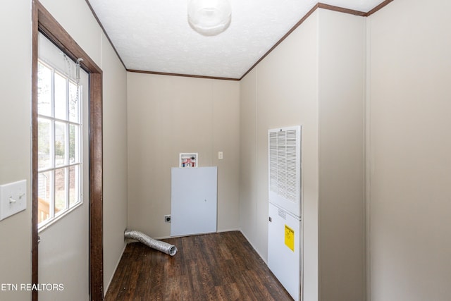 clothes washing area featuring a textured ceiling, washer hookup, electric dryer hookup, dark hardwood / wood-style flooring, and ornamental molding