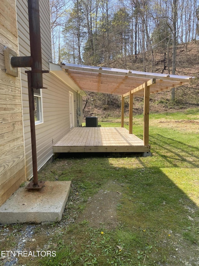 6716 War Creek Rd, Thorn Hill, TN 37881 - view of grassy yard featuring a deck and central AC unit