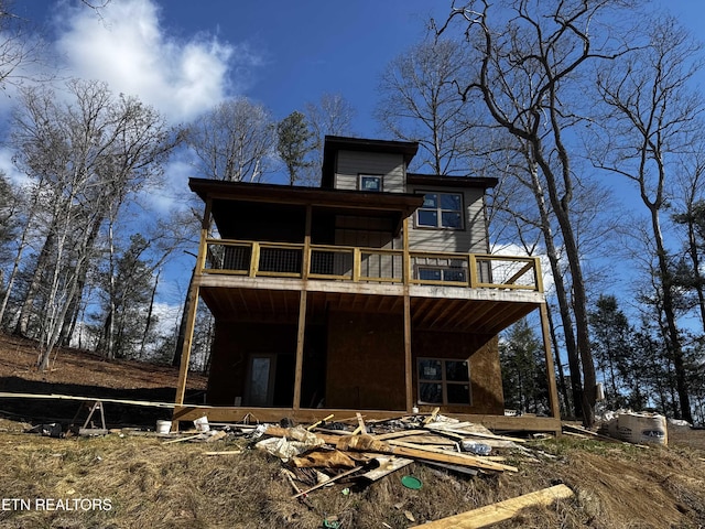 rear view of house with a deck