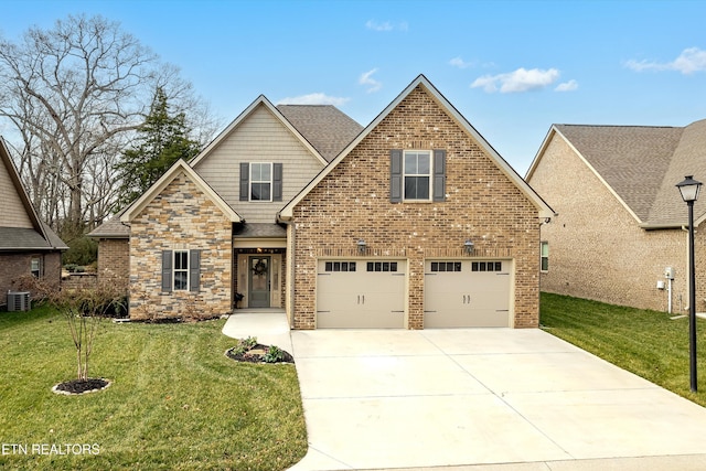 view of front of property featuring brick siding, stone siding, concrete driveway, and a front yard