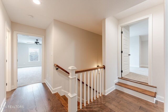 282 Chimney Rock Dr, Lenoir City, TN 37771 - corridor featuring an upstairs landing, baseboards, and wood finished floors