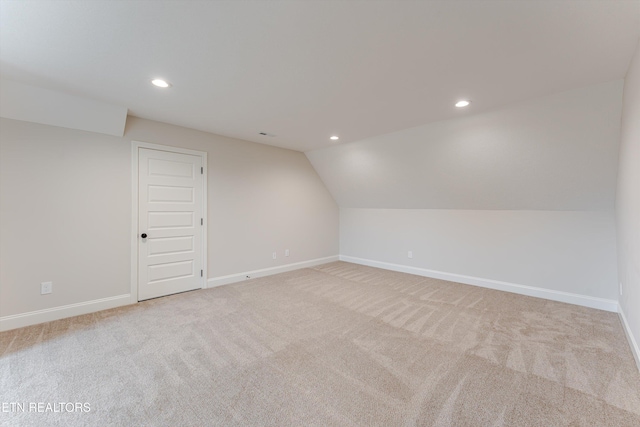282 Chimney Rock Dr, Lenoir City, TN 37771 - additional living space with baseboards, lofted ceiling, recessed lighting, and carpet flooring