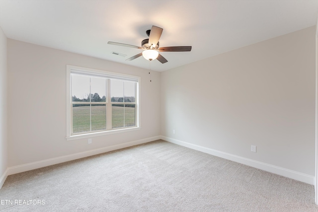 282 Chimney Rock Dr, Lenoir City, TN 37771 - empty room with a ceiling fan, light carpet, baseboards, and visible vents