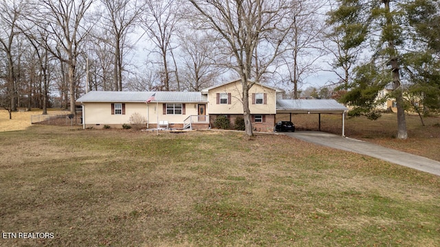 split level home with a carport and a front yard