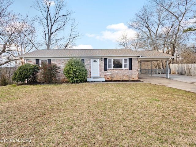 single story home with a front yard and a carport