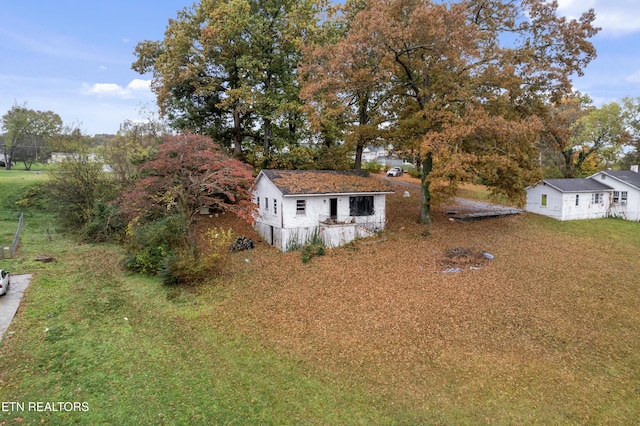 exterior space featuring a front lawn