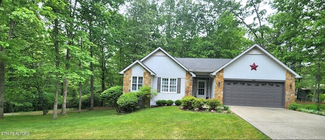 single story home with a front yard and a garage