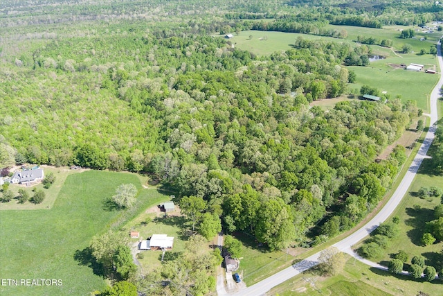 drone / aerial view with a forest view