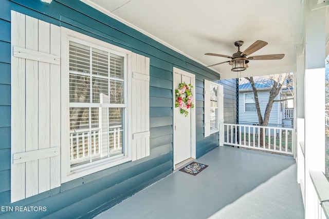 exterior space featuring covered porch and ceiling fan