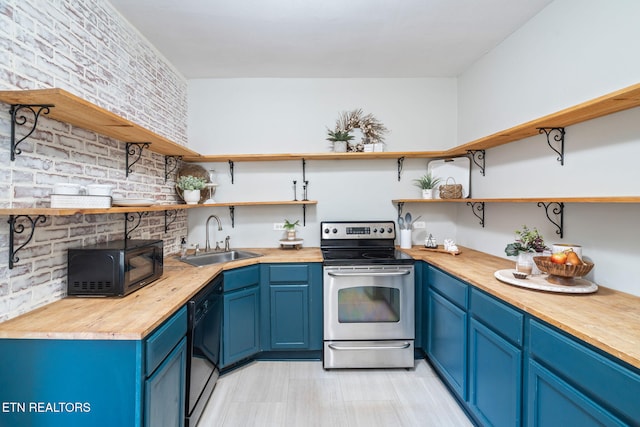 kitchen with open shelves, black appliances, a sink, and wooden counters