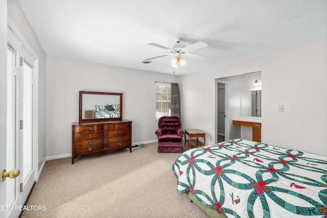 bedroom featuring a textured ceiling, carpet flooring, and ceiling fan