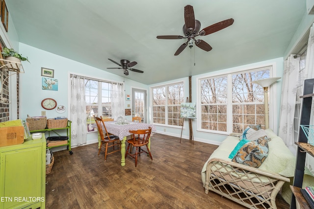 sunroom with lofted ceiling and ceiling fan