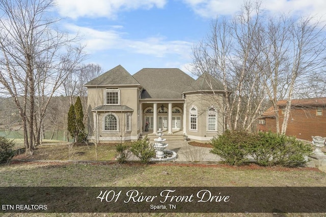 view of front of home featuring stucco siding