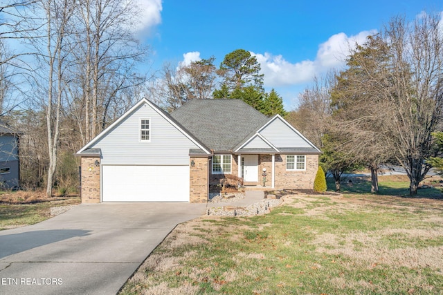 view of front of house with brick siding, a shingled roof, a garage, driveway, and a front lawn