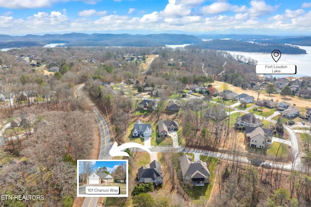 birds eye view of property featuring a residential view and a mountain view