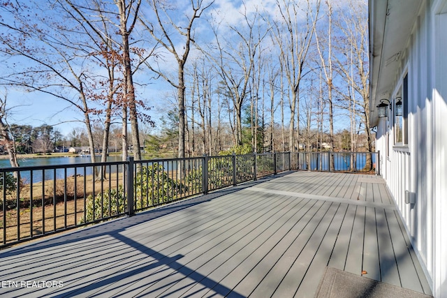 wooden terrace with a water view