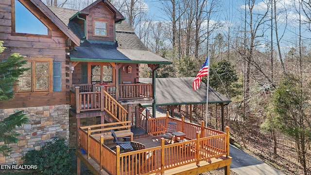 wooden deck featuring covered porch