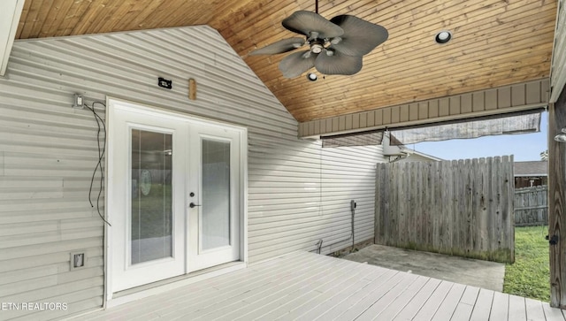 wooden terrace with ceiling fan and french doors