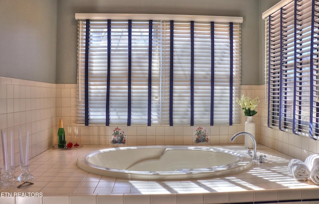 full bathroom with a bath