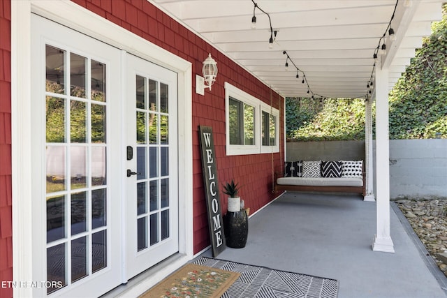 view of patio featuring french doors