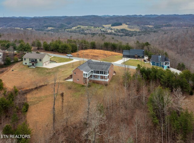 bird's eye view featuring a forest view