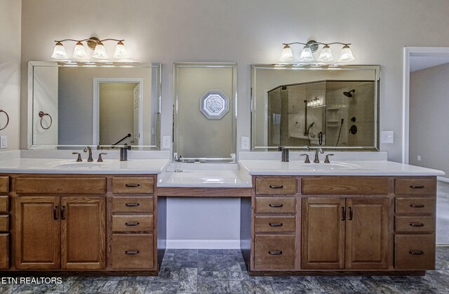 full bathroom with a stall shower and vanity